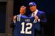 NEW YORK, NY - APRIL 26: Andrew Luck (R) from Stanford holds up a jersey as he stands on stage with NFL Commissioner Roger Goodell after Luck was selected #1 overall by the Indianapolis Colts in the first round of the 2012 NFL Draft at Radio City Music H