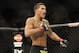 Jan 26, 2013; Chicago, IL, USA; Anthony Pettis celebrates after defeating Donald Cerrone (not pictured) during UFC on FOX 6 at the United Center. Mandatory Credit: David Banks-USA TODAY Sports