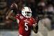 Dec 28, 2013; Orlando, FL, USA; Louisville Cardinals quarterback Teddy Bridgewater (5) sets to throw during the second half of the Russell Athletic Bowl against the Miami Hurricanes at Florida Citrus Bowl Stadium. Mandatory Credit: Rob Foldy-USA TODAY Spo