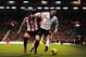 LONDON, ENGLAND - JANUARY 11: (L-R) Phil Bardsley of Sunderland and Clint Dempsey of Fulham challenge for the ball during the Barclays Premier League match between Fulham and Sunderland at Craven Cottage on January 11, 2014 in London, England. (Photo by