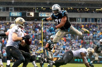 Hi-res-460840127-greg-hardy-of-the-carolina-panthers-goes-after-drew_crop_exact