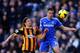 HULL, ENGLAND - JANUARY 11: George Boyd of Hull City and Cesar Azpilicueta of Chelsea compete for the ball during the Barclays Premier League match between Hull City and Chelsea at KC Stadium on January 11, 2014 in Hull, England. (Photo by Laurence Grif