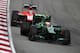 Caterham's Giedo van der Garde and Marussia's Jules Bianchi.