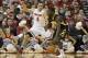 Jan 12, 2014; Columbus, OH, USA; Iowa Hawkeyes forward Melsahn Basabe (0) tries to get to the basket as Ohio State Buckeyes guard Aaron Craft (4) defends at the Schottenstein Center. Mandatory Credit: Greg Bartram-USA TODAY Sports
