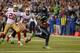 SEATTLE, WA - SEPTEMBER 15: Running back Marshawn Lynch #24 of the Seattle Seahawks rushes for a touchdown in the third quarter against the San Francisco 49ers at CenturyLink Field on September 15, 2013 in Seattle, Washington. (Photo by Otto Greule Jr/G