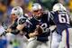 FOXBORO, MA - JANUARY 11: Tom Brady #12 of the New England Patriots in action against the Indianapolis Colts during the AFC Divisional Playoff game at Gillette Stadium on January 11, 2014 in Foxboro, Massachusetts. (Photo by Jim Rogash/Getty Images)