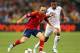 DONETSK, UKRAINE - JUNE 23: Andres Iniesta of Spain and Yann M'Vila of France in action during the UEFA EURO 2012 quarter final match between Spain and France at Donbass Arena on June 23, 2012 in Donetsk, Ukraine. (Photo by Alex Livesey/Getty Images)