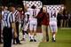 Nov 16, 2013; Starkville, MS, USA; Alabama Crimson Tide quarterback Alec Morris (11) and Alabama Crimson Tide quarterback Luke Del Rio (14) block the view from the Mississippi State Bulldogs defensive coordinators during the game at Davis Wade Stadium. Ma