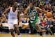 Jan 5, 2014; Oklahoma City, OK, USA; Boston Celtics shooting guard Jordan Crawford (27) handles the ball while being guarded by Oklahoma City Thunder point guard Reggie Jackson (15) during the second quarter at Chesapeake Energy Arena. Mandatory Credit: M