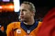 DENVER, CO - JANUARY 12: Peyton Manning #18 of the Denver Broncos reacts after their 24 to 17 win over the San Diego Chargers during the AFC Divisional Playoff Game at Sports Authority Field at Mile High on January 12, 2014 in Denver, Colorado. (Photo