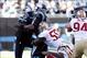 49ers outside 'backer Ahmad Brooks wraps up Panthers quarterback Cam Newton for one of his 2.5 sacks.