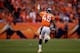 DENVER, CO - OCTOBER 27: Cornerback Dominique Rodgers-Cromartie #45 of the Denver Broncos strides towards the end zone for a touchdown after making an interception on a pass intended for wide receiver Pierre Garcon #88 of the Washington Redskins during t