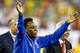 FOXBORO, MA - SEPTEMBER 10: Former Brazillian soccer player, Pele, waves to the crowd prior to the international friendly match between Brazil and Portugal at Gillette Stadium on September 10, 2013 in Foxboro, Massachusetts. (Photo by Jared Wickerham/Gett