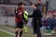 MILAN, ITALY - DECEMBER 16: Head coach AC Milan Massimiliano Allegri speaks with Kaka (L) during the Serie A match between AC Milan and AS Roma at San Siro Stadium on December 16, 2013 in Milan, Italy. (Photo by Claudio Villa/Getty Images)