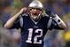 Jan 11, 2014; Foxborough, MA, USA; New England Patriots quarterback Tom Brady (12) gestures at the line in the second half during the 2013 AFC divisional playoff football game against the Indianapolis Colts at Gillette Stadium. Mandatory Credit: Mark L. B