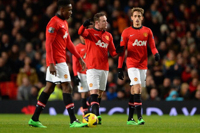 Hi-res-459964455-wayne-rooney-of-manchester-united-speaks-to-team-mate_crop_exact