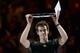 MELBOURNE, AUSTRALIA - JANUARY 27: Andy Murray of Great Britain holds the runner up plate after losing his men's final match against Novak Djokovic of Serbia during day fourteen of the 2013 Australian Open at Melbourne Park on January 27, 2013 in Melbour