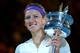 MELBOURNE, AUSTRALIA - JANUARY 26: Victoria Azarenka of Belarus poses with the Daphne Akhurst Memorial Cup after winning her women's final match against Na Li of Chinaduring day thirteen of the 2013 Australian Open at Melbourne Park on January 26, 2013 i