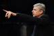 NEWCASTLE UPON TYNE, ENGLAND - DECEMBER 29: Arsene Wenger, manager of Arsenal makes his point during the Barclays Premier League match between Newcastle United and Arsenal at St James' Park on December 29, 2013 in Newcastle upon Tyne, England. (Photo by