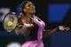 MELBOURNE, AUSTRALIA - JANUARY 13: Serena Williams of USA plays a forehand in her first round match against Ashleigh Barty of Australia during day one of the 2014 Australian Open at Melbourne Park on January 13, 2014 in Melbourne, Australia. (Photo by C