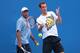 MELBOURNE, AUSTRALIA - JANUARY 12: Andy Murray of Great Britain plays a forehand whilst his coach Ivan Lendl watches on during practice ahead of the 2014 Australian Open at Melbourne Park on January 12, 2014 in Melbourne, Australia. (Photo by Quinn Roon