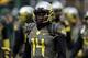 Nov 16, 2013; Eugene, OR, USA; Oregon Ducks cornerback Ifo Ekpre-Olomu (14) warms up before the game against the Utah Utes at Autzen Stadium. Mandatory Credit: Scott Olmos-USA TODAY Sports