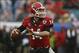 Jan 1, 2014; Jacksonville, FL, USA; Georgia Bulldogs quarterback Hutson Mason (14) throws a pass in the fourth quarter of their game against the Nebraska Cornhuskers at EverBank Field. The Nebraska Cornhuskers beat the Georgia Bulldogs 24-19. Mandatory Cr