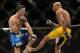 Dec 28, 2013; Las Vegas, NV, USA; (EDITORS NOTE: graphic content) Anderson Silva (blue gloves) breaks his leg on a kick to Chris Weidman (red gloves) during their UFC middleweight championship bout at the MGM Grand Garden Arena. Mandatory Credit: Jayne