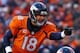 DENVER, CO - JANUARY 12: Peyton Manning #18 of the Denver Broncos calls a play during the AFC Divisional Playoff Game against the San Diego Chargers at Sports Authority Field at Mile High on January 12, 2014 in Denver, Colorado. (Photo by Doug Pensinge