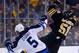 BOSTON, MA - JANUARY 04: Ryan Spooner #51 of the Boston Bruins is hit by Mark Stuart #5 of the Winnipeg Jets in the first period during the game at TD Garden on January 4, 2014 in Boston, Massachusetts. (Photo by Jared Wickerham/Getty Images)