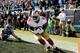 CHARLOTTE, NC - JANUARY 12: Vernon Davis #85 of the San Francisco 49ers catches a touchdown in the second quarter against the Carolina Panthers during the NFC Divisional Playoff Game at Bank of America Stadium on January 12, 2014 in Charlotte, North Caro