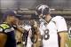Aug 17, 2013; Seattle, WA, USA; Seattle Seahawks quarterback Russell Wilson (3) and Denver Broncos quarterback Peyton Manning (18) speak following a 40-10 preseason victory by the Seahawks at CenturyLink Field. Mandatory Credit: Joe Nicholson-USA TODAY Sp