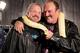 Diamond Dallas Page and Jake Roberts celebrate Roberts' return to Raw.