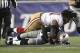 Dec 16, 2012; Foxboro, Massachusetts, USA; New England Patriots quarterback Tom Brady (12) gets sacked by San Francisco 49ers defensive end Ray McDonald (91) during the fourth quarter at Gillette Stadium. The San Francisco 49ers won 41-34. Mandatory Cred