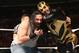 Goldust grabs hold of Luke Harper of the Wyatt Family.