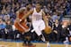 OKLAHOMA CITY, OK - JANUARY 11, 2014: Jeremy Lamb #11 of the Oklahoma City Thunder drives to the basket against the Milwaukee Bucks at the Chesapeake Arena on January 11, 2014 in Oklahoma City, Oklahoma. NOTE TO USER: User expressly acknowledges and agr