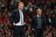 MANCHESTER, ENGLAND - AUGUST 26: Manchester United Manager David Moyes and Chelsea Manager Jose Mourinho (R) look on during the Barclays Premier League match between Manchester United and Chelsea at Old Trafford on August 26, 2013 in Manchester, England.