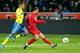 STOCKHOLM, SWEDEN - NOVEMBER 19: Cristiano Ronaldo of Portugal scores their opening goal during the FIFA 2014 World Cup Qualifier Play-off Second Leg match between Sweden and Portugal at Friends Arena on November 19, 2013 in Stockholm, Sweden. (Photo by