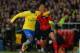 CARDIFF, WALES - NOVEMBER 30: Bacary Sagna of Arsenal tussles with Peter Odemwingie of Cardiff during the Barclays Premier League match between Cardiff City and Arsenal at Cardiff City Stadium on November 30, 2013 in Cardiff, Wales. (Photo by Christophe