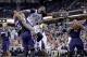 Jan 4, 2014; Sacramento, CA, USA; Sacramento Kings center DeMarcus Cousins (15) loses control of the ball next to Charlotte Bobcats center Al Jefferson (25) in the fourth quarter at Sleep Train Arena. The Bobcats defeated the Kings 113-103. Mandatory Cred