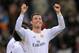 MADRID, SPAIN - JANUARY 06: Cristiano Ronaldo of Real Madrid CF celebrates after scoring their third goal during the La Liga match between Real Madrid CF and RC Celta de Vigo at the Santiago Bernabeu stadium on January 6, 2014 in Madrid, Spain. (Photo b