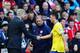 SUNDERLAND, ENGLAND - SEPTEMBER 14: Arsenal manager Arsene Wenger shakes hands with Mesut Oezil of Arsenal as he is substituted during the Barclays Premier League match between Sunderland and Arsenal at the Stadium of Light on September 14, 2013 in Sunder
