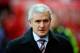 STOKE ON TRENT, ENGLAND - JANUARY 04: Stoke City manager Mark Hughes walks to his dug out during the Budweiser FA Cup third round match between Stoke City and Leicester City at the Britannia Stadium on January 4, 2014 in Stoke on Trent, England. (Photo