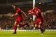 LONDON, ENGLAND - DECEMBER 15: Jon Flanagan of Liverpool celebrates scoring their third goal with Joe Allen of Liverpool during the Barclays Premier League match between Tottenham Hotspur and Liverpool at White Hart Lane on December 15, 2013 in London,