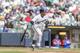 MILWAUKEE, WI - AUGUST 19: Carlos Gomez #27 of the Milwaukee Brewers watches his home run ball against the Chicago Cubs at Miller Park on September 19, 2013 in Milwaukee, Wisconsin. (Photo by Tom Lynn/Getty Images)