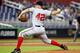 MIAMI, FL - APRIL 15: Pitcher Jordan Zimmerman of the Washington Nationals throws against the Miami Marlins in the first inning at Marlins Park on April 15, 2013 in Miami, Florida. All uniformed team members are wearing jersey number 42 in honor of Jacki