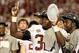 Jan 7, 2013; Miami, FL, USA; Alabama Crimson Tide linebacker C.J. Mosley (32) celebrates with the Coaches Trophy after the 2013 BCS Championship game against the Notre Dame Fighting Irish at Sun Life Stadium. Alabama won 42-14. Mandatory Credit: Matthew