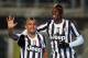 BERGAMO, ITALY - DECEMBER 22: Arturo Vidal (L) of Juventus celebrates with teamt-mate Paul Pogba after scoring their fourth goal during the Serie A match between Atalanta BC and Juventus at Stadio Atleti Azzurri d'Italia on December 22, 2013 in Bergamo,