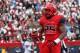 TUCSON, AZ - NOVEMBER 23: Running back Ka'Deem Carey #25 of the Arizona Wildcats reacts after scoring on a 6 yard rushing touchdown against the Oregon Ducks during the first quarter of the college football game at Arizona Stadium on November 23, 2013 in