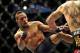 Jan, 20 2012; Nashville, TN, USA; UFC bantamweight Mike Easton kicks Jared Papazian during a bout in the UFC on FX 1 event. Easton defeated Papazian. Mandatory Credit: Don McPeak-USA TODAY Sports